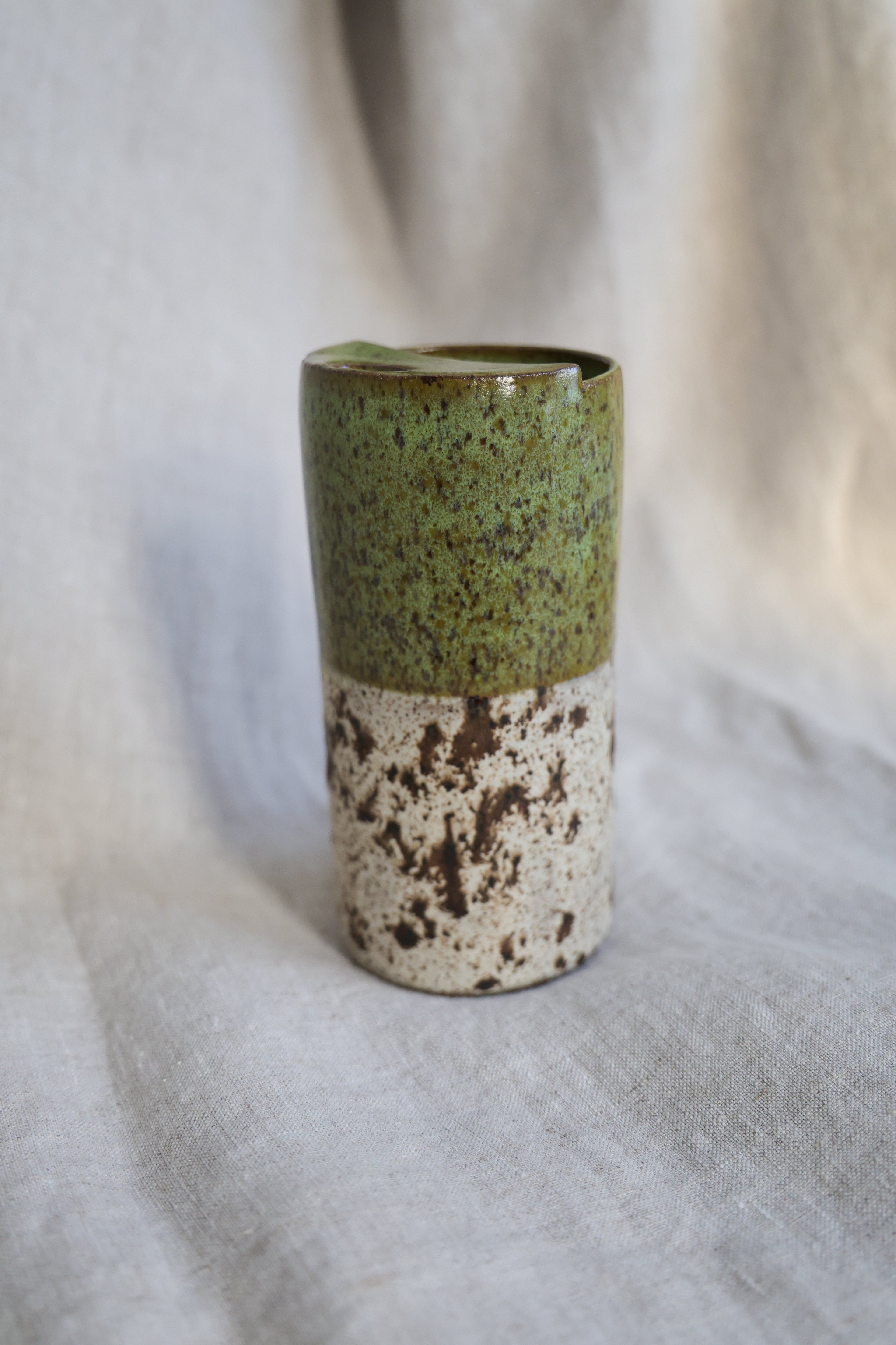 Green travel mug with creamy speckled bottom, Mustache Saver, Ceramic Stoneware Hand Thrown in Maine 14-16oz.
