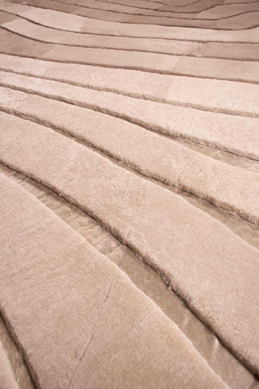 OMBRÉ – Sculptural Shearling & Cowhide Rug