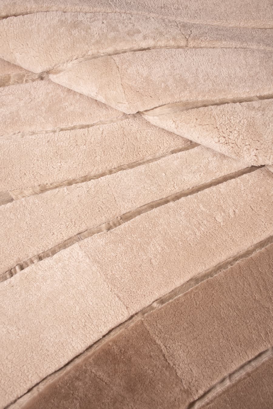 OMBRÉ – Sculptural Shearling & Cowhide Rug